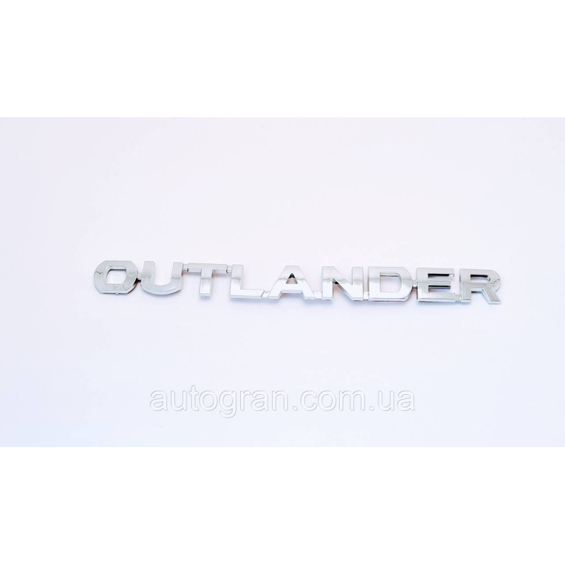 Емблема напис багажника Mitsubishi Outlander