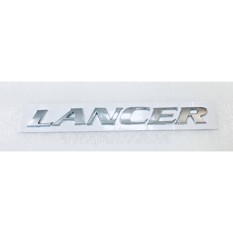 Емблема напис багажника Mitsubishi Lancer