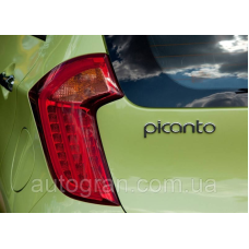 Емблема напис багажника Kia Picanto 86320-07000