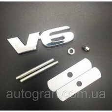 Емблема решітки радіатора V6 8.3 x 2.4 см