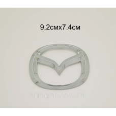 Емблема решітки радіатора та кришки багажника Mazda 9.2 смх7.4 см