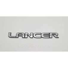 Емблема напис багажника Mitsubishi Lancer