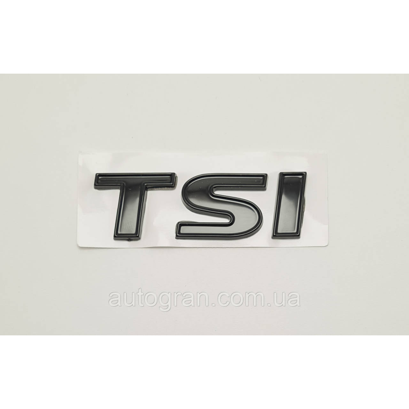 Емблема напис багажника VW Volkswagen TSI Golf Caddy T5 Tiguan Touran 2009 - чорна Емблема напис багажника VW Volkswagen TSI Golf Caddy T5 Tiguan Touran 2009 - чорна