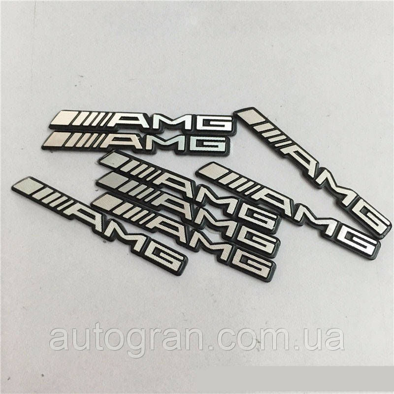 Емблема на колонки, кермо, двері Mercedes AMG 