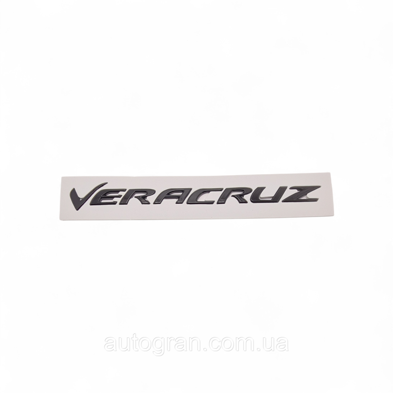Емблема напис багажника Hyundai Veracruz 863103J000 чорна